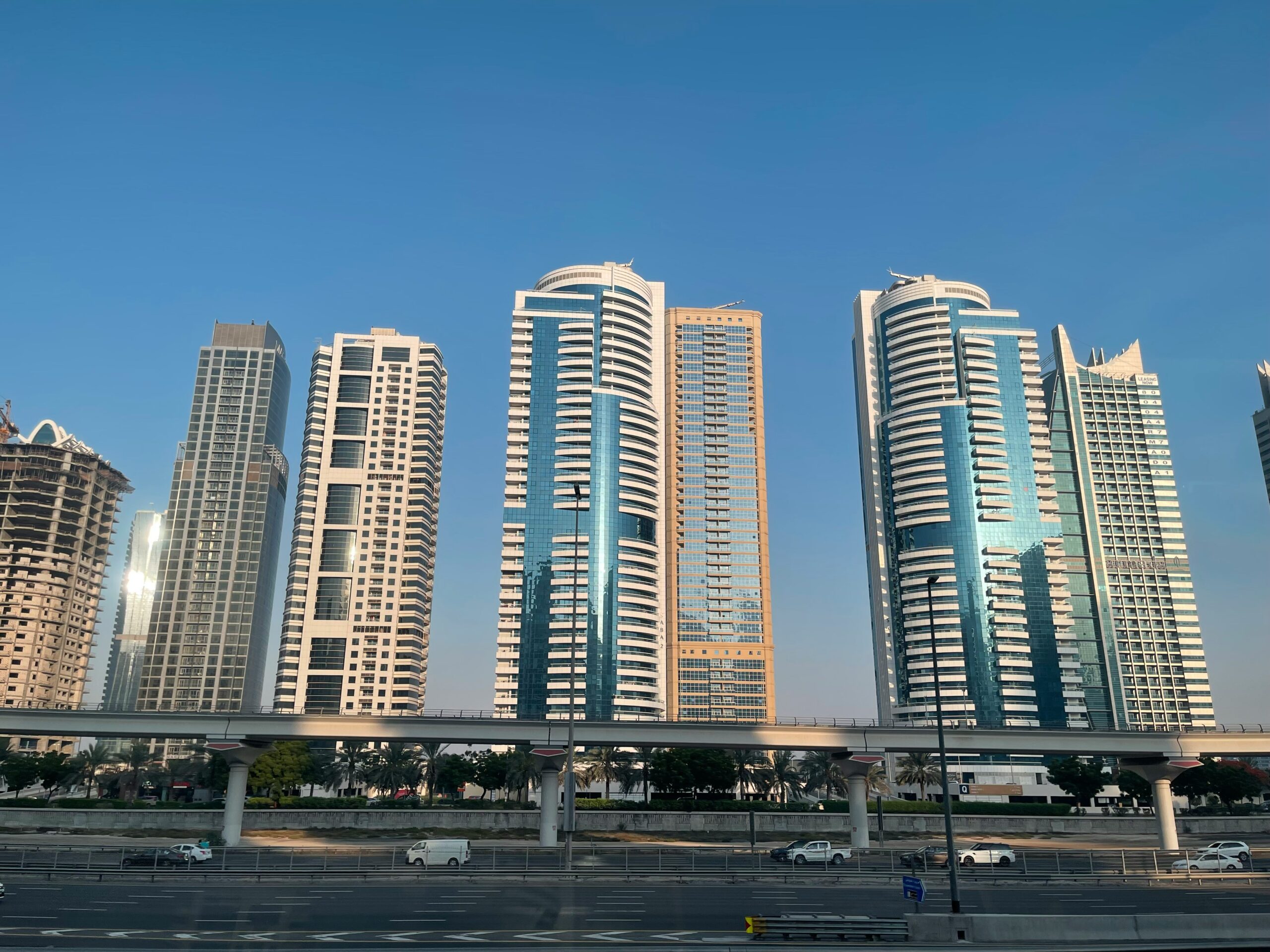 a group of tall buildings sitting next to each other