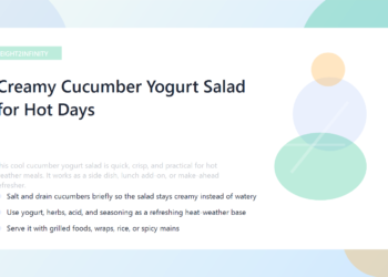 A chilled bowl of cucumber yogurt salad with dill in natural light.