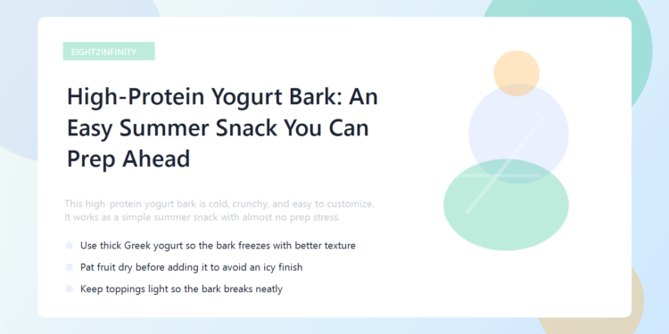 High-Protein Yogurt Bark: An Easy Summer Snack You Can Prep Ahead 1 A tray of yogurt bark topped with berries, pistachios, and crunchy granola.