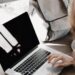 How to Start Freelancing With No Experience 6 A freelancer working on a laptop at a desk
